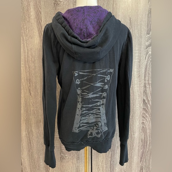 Vexy Tops - VEXY Black & Purple with ruffle front panel and graphic corset back.